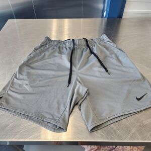 Nike Men's Light Gray Athletic Shorts with Black Drawstring